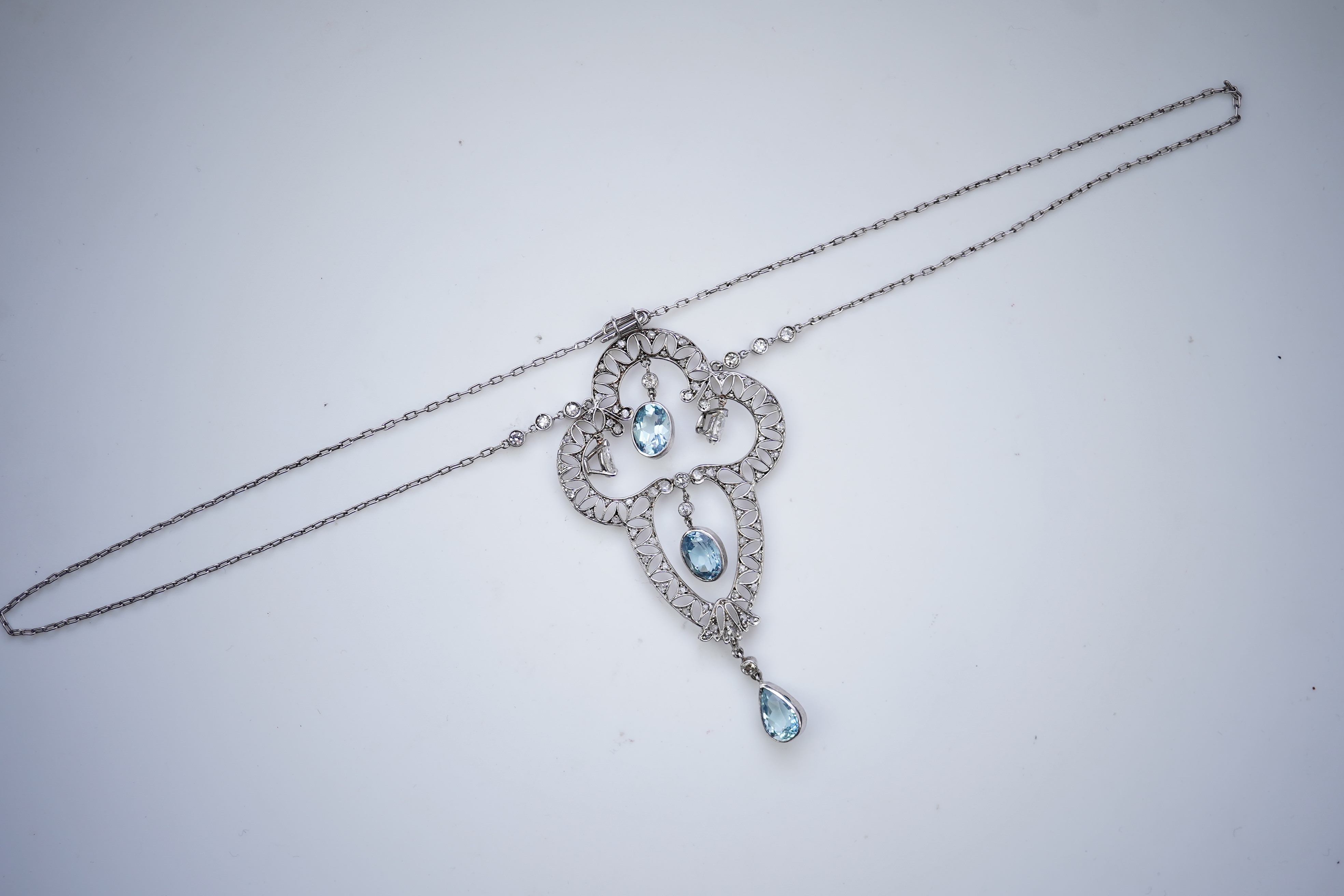 An Edwardian aquamarine and diamond pendant, circa 1910